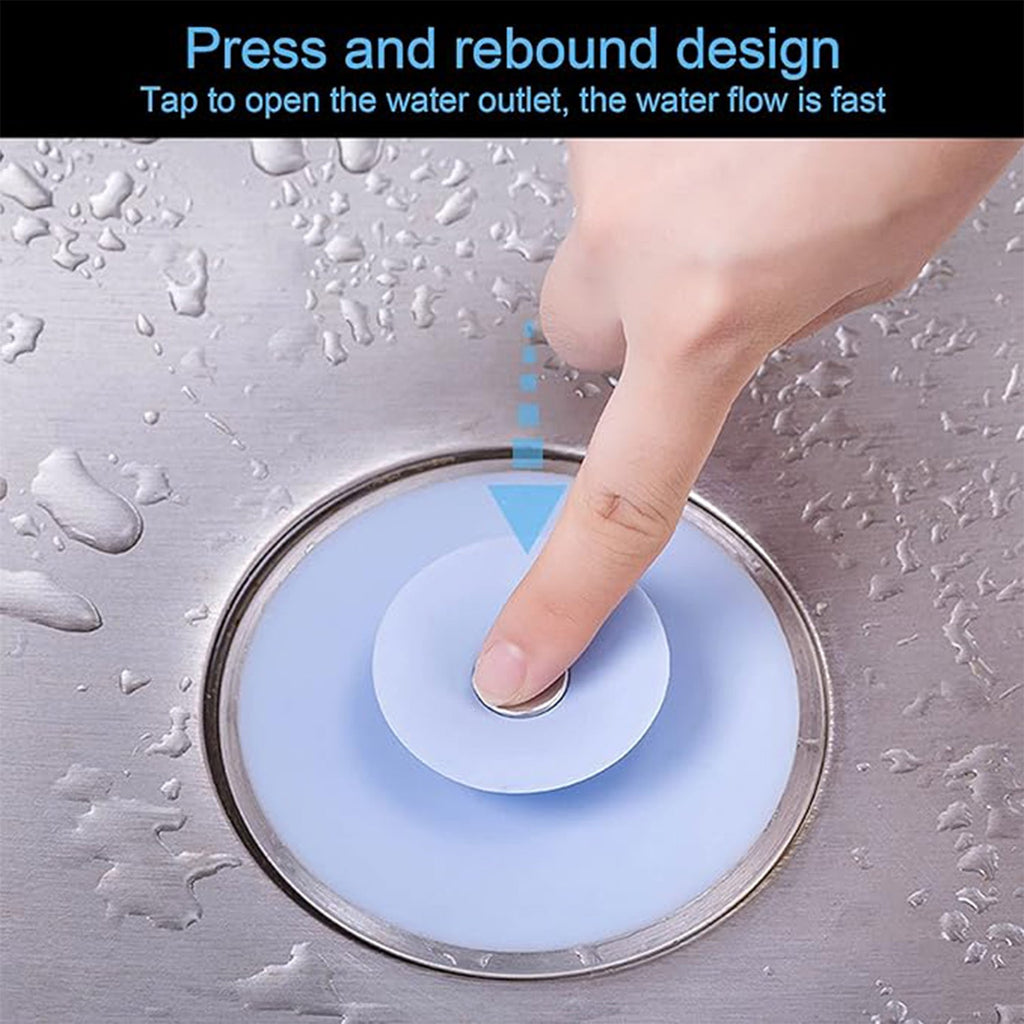 Eco-friendly blue silicone 2-in-1 sink stopper and strainer placed on kitchen sink