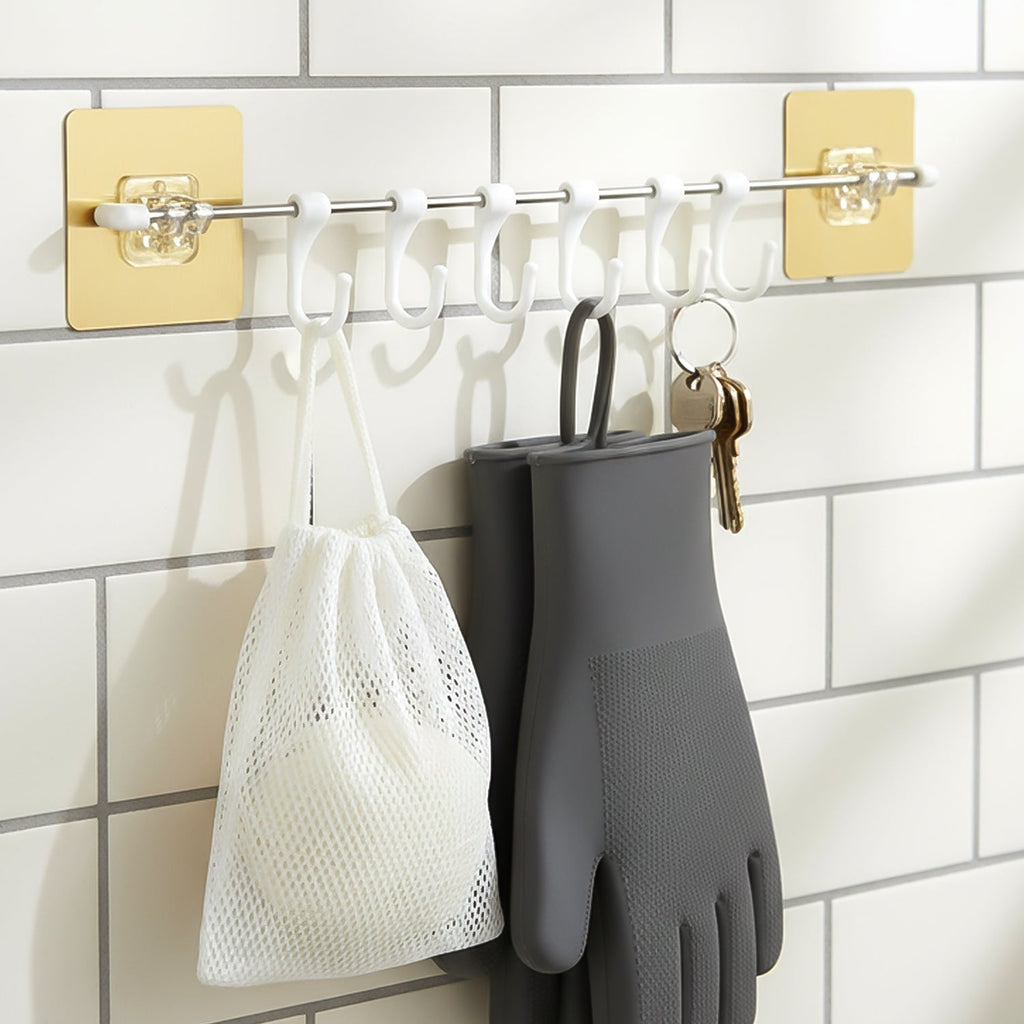 Wall hook bar showing strong adhesive mount and stainless steel rod for kitchen organization