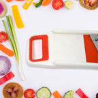 Packaging of the Quickslice 6-in-1 vegetable slicer, cutter, and fruit dicer.