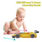 Children's musical car toy, complete with a mallet for interactive and engaging play sessions.