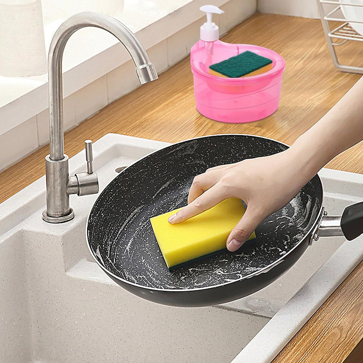 Compact soap dispenser with sponge holder on a modern kitchen sink.