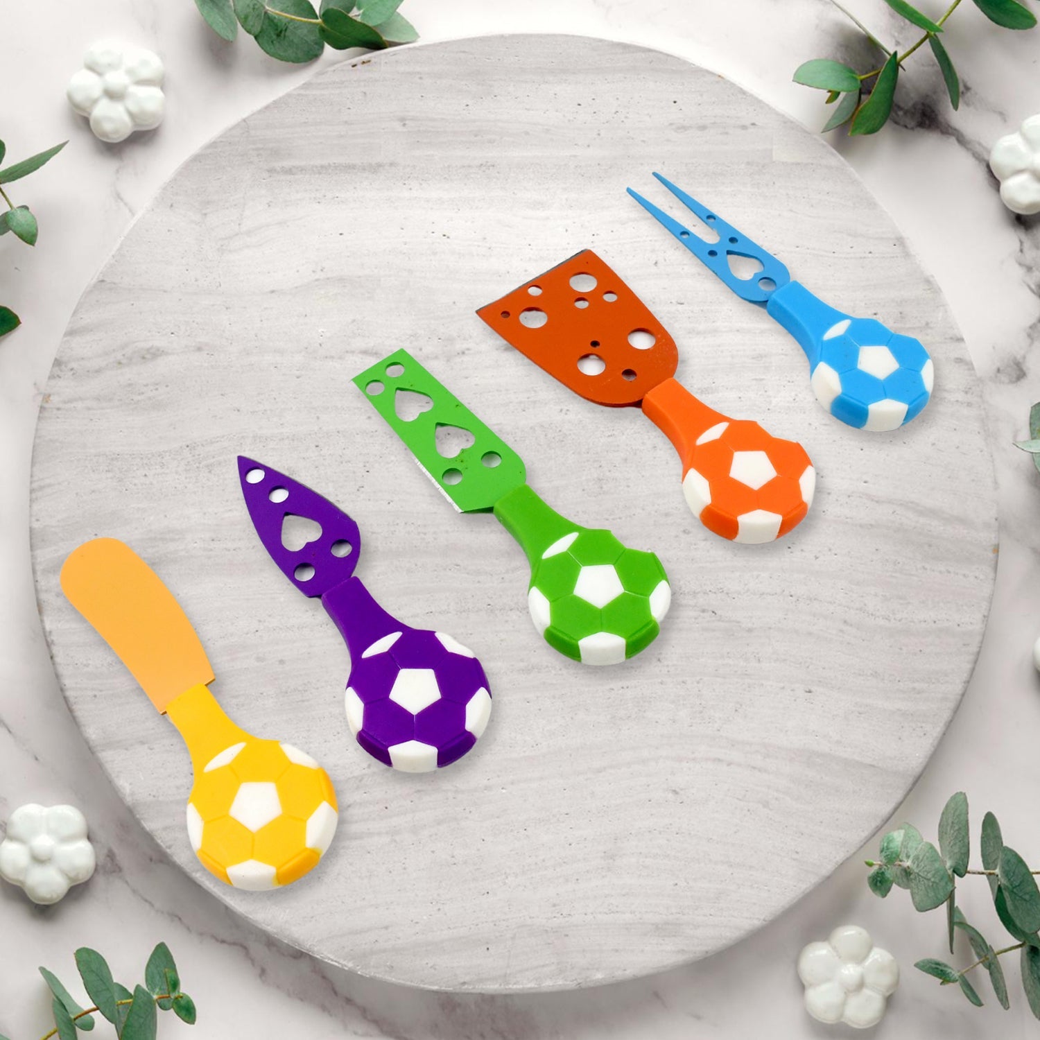 Close-up of the sports-inspired cheese knife set with various blades.