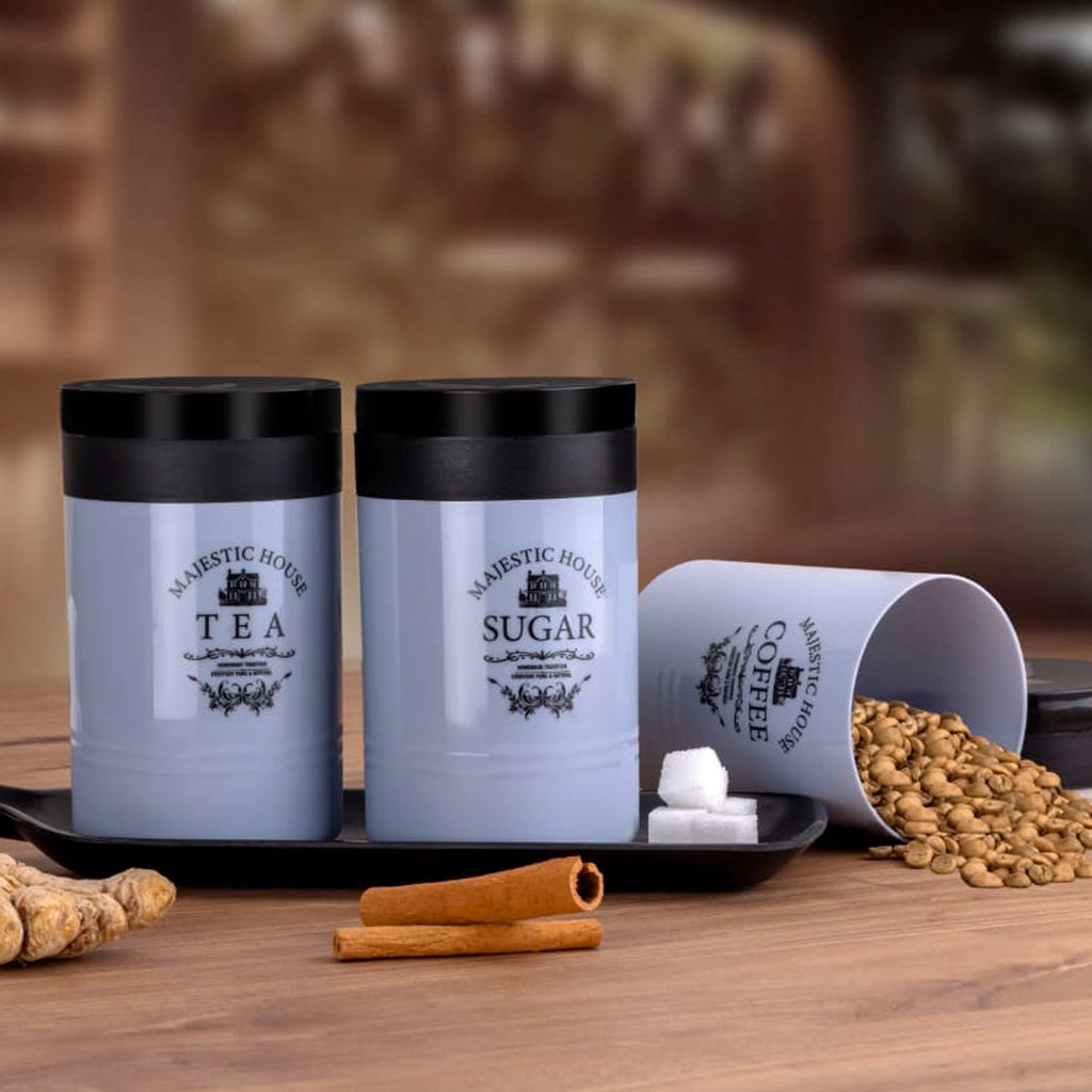 Three plastic damru-shaped airtight containers labeled 'Tea', 'Coffee', 'Sugar' on a white background.