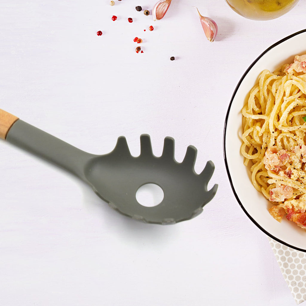 Top-down view highlighting the simple and functional design of the plastic kitchen utensil.