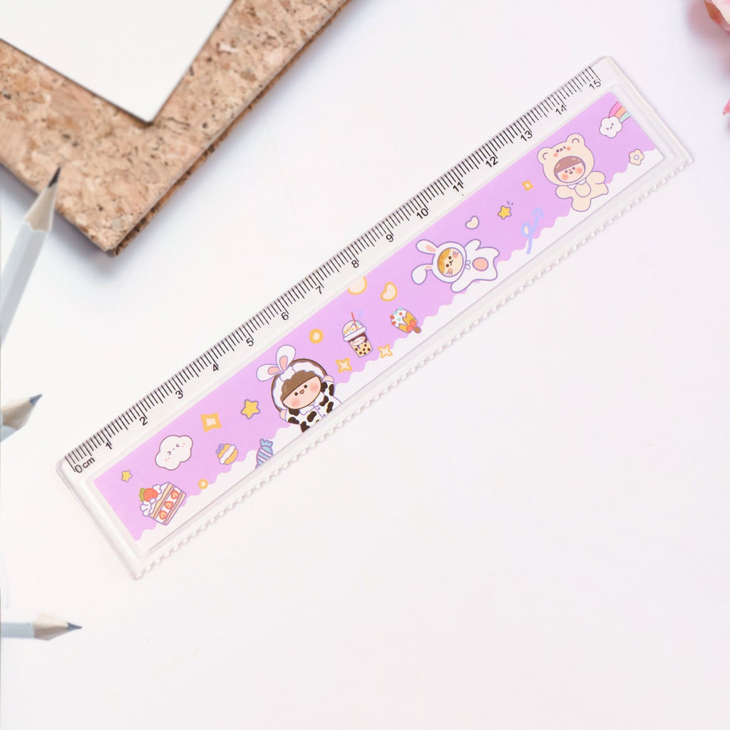 Children using cartoon-themed plastic ruler for drawing and geometry