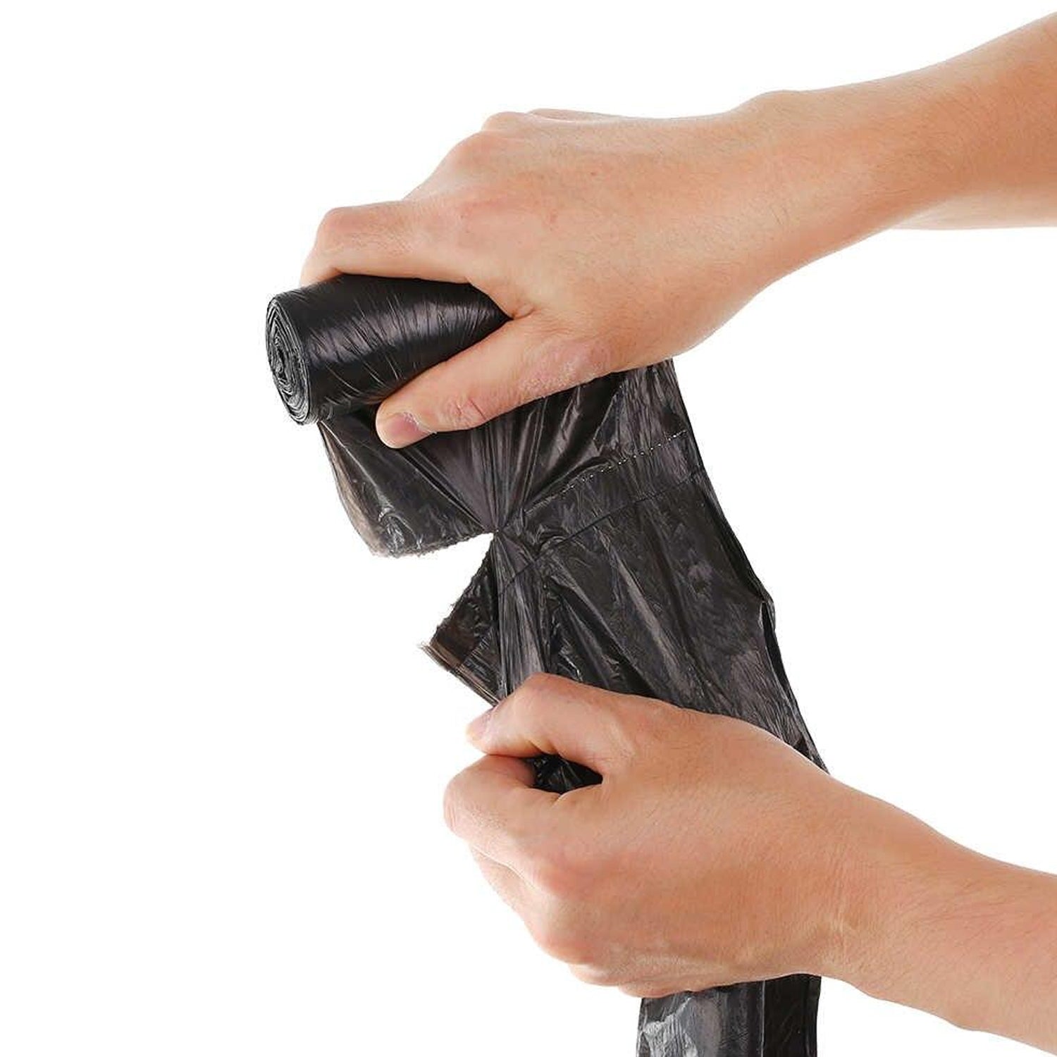 A hand holding a tied black dustbin bag, ready for hygienic and contained waste disposal.