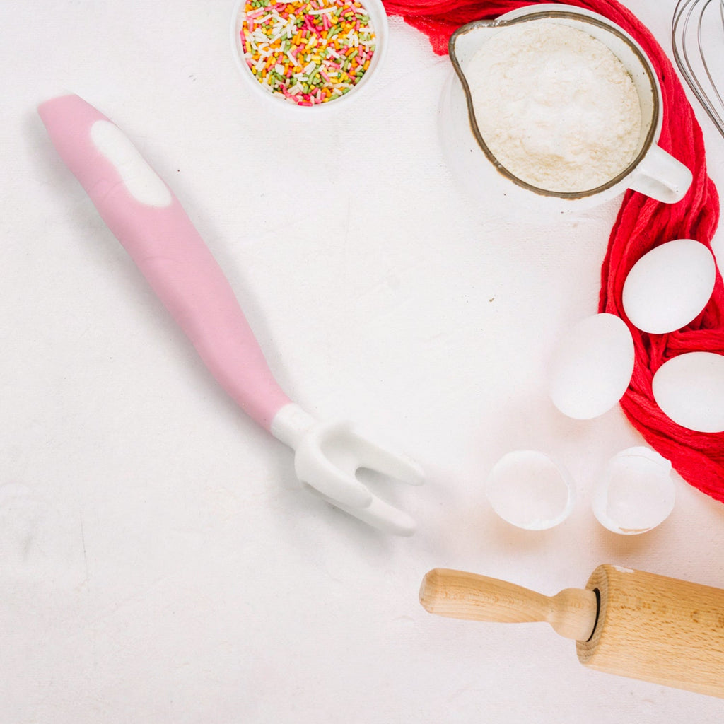 Portable kids self-feeding utensils neatly packed in their clear travel case.