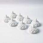 Lotus shaped LED flameless tealight candles used for festive puja decor