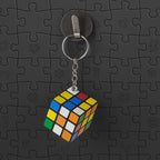 Mini Magic Cube Puzzle keychain rotated to display its intricate design.