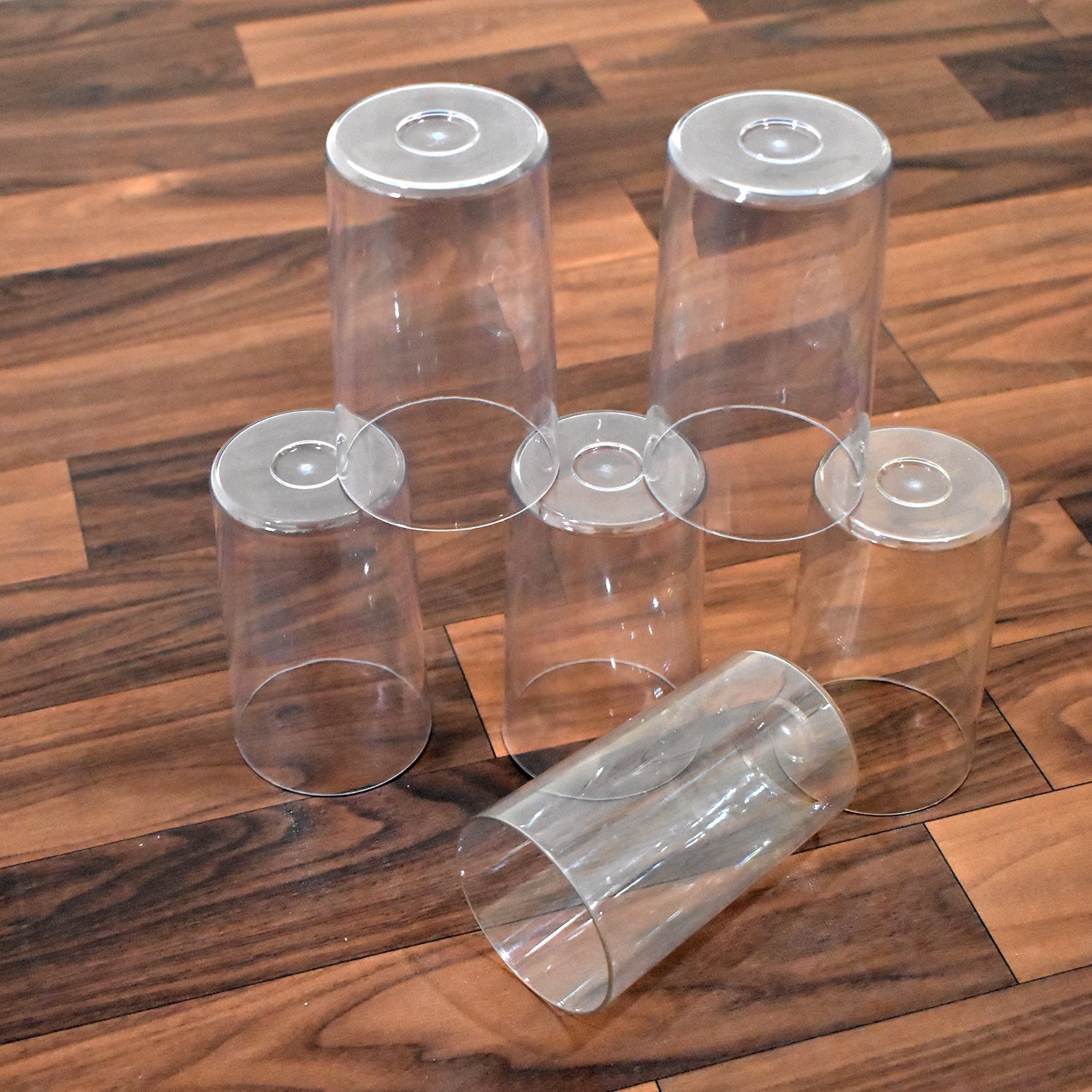 Lifestyle image of the Ganesh Classic plastic glasses set being used in a home setting.