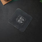 Easy installation of a transparent adhesive wall hook on a smooth wall surface.