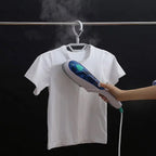 Portable Garment Steamer in use, quickly removing wrinkles from clothing.