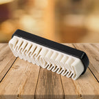 Rubber shoe cleaning brush showing textured surface