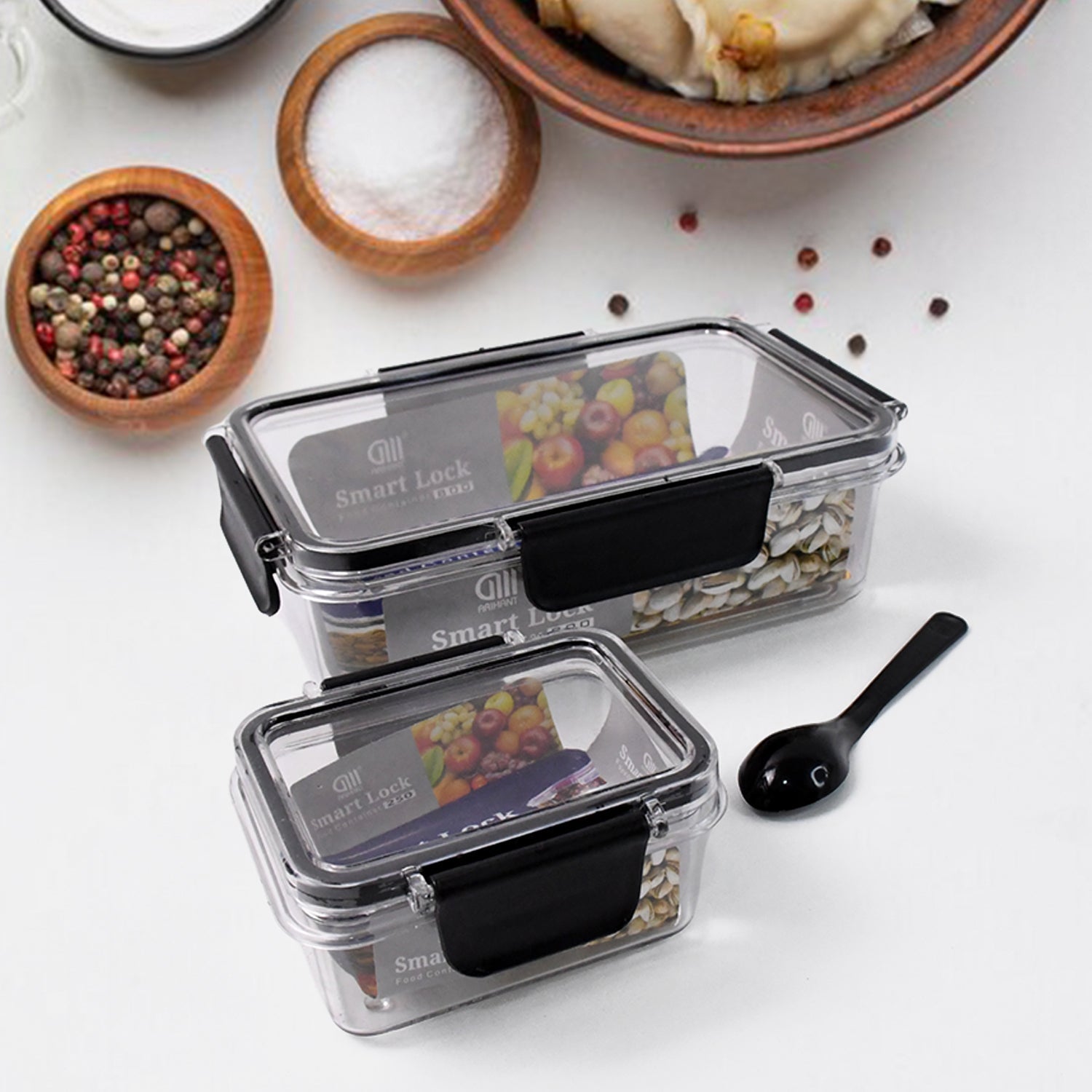 Empty airtight plastic containers with air seal lids, ready for food storage