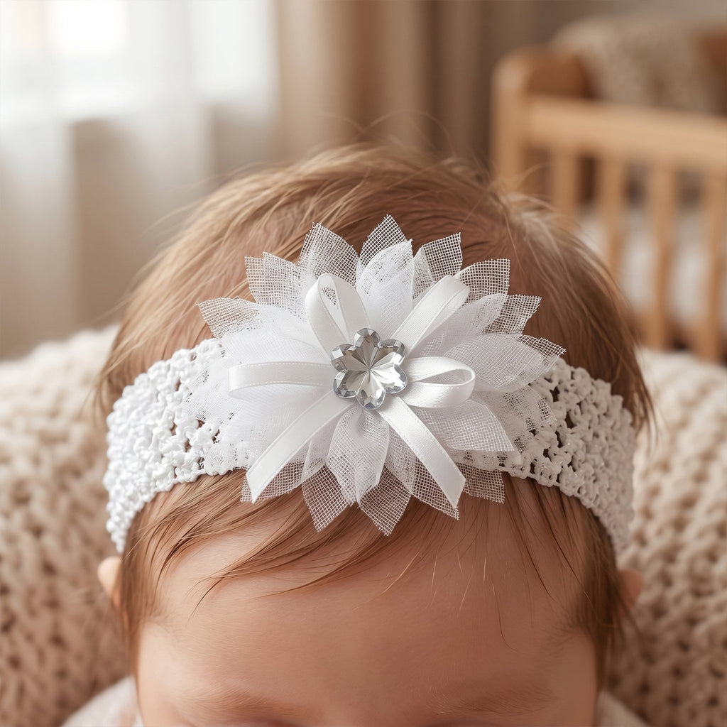 Delicate baby girl headband with floral bow, gentle on skin