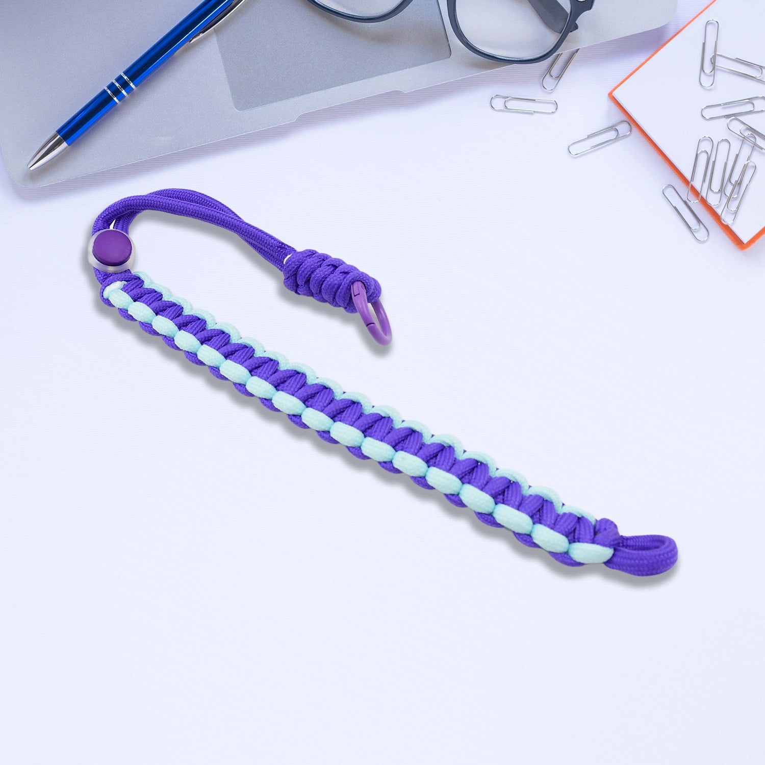 Ergonomic hand wrist strap providing a comfortable and secure grip.