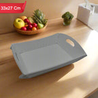 Foldable serving tray arranged with snacks in a modern kitchen setting, showcasing its utility.