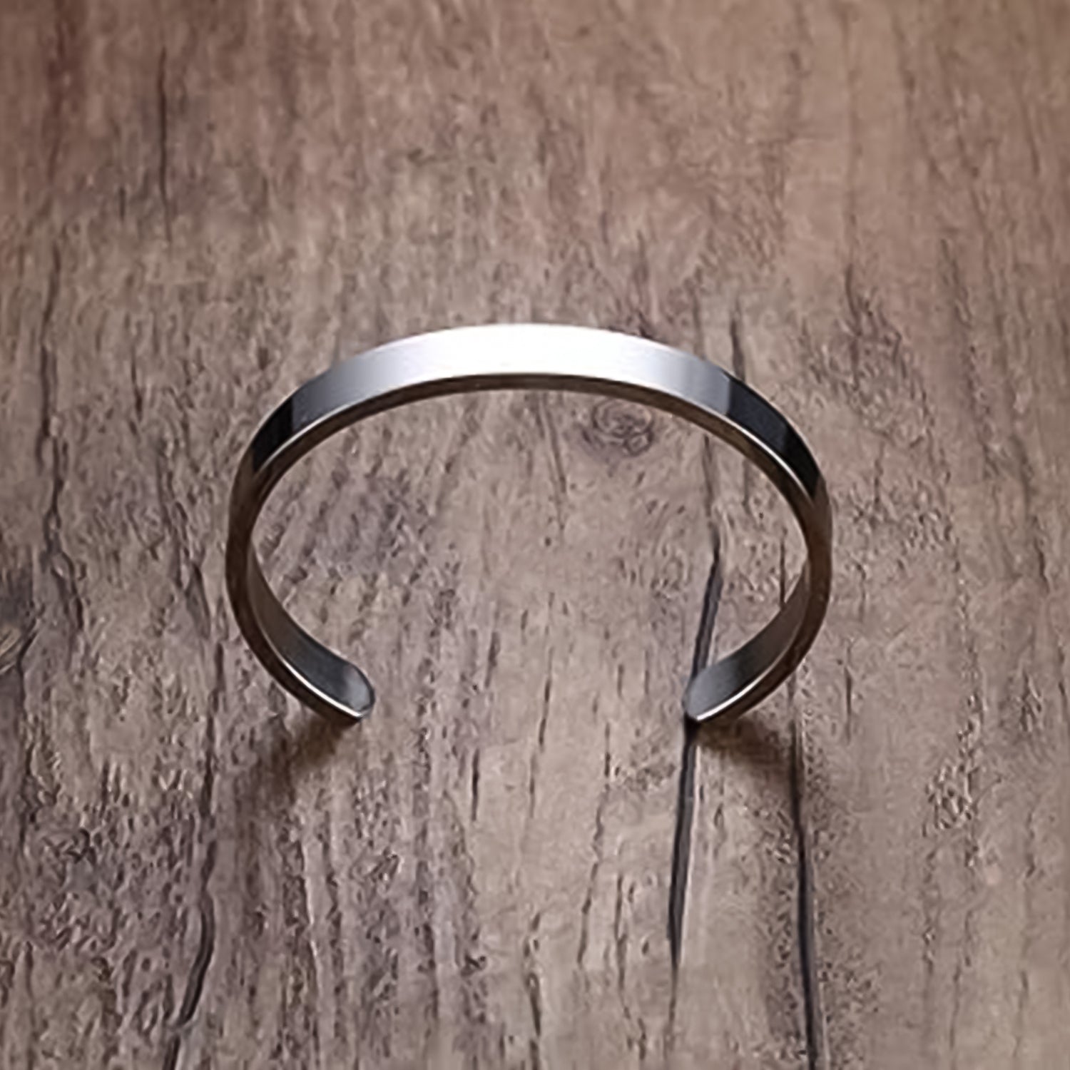 Designer silver-tone stainless steel open cuff bracelet