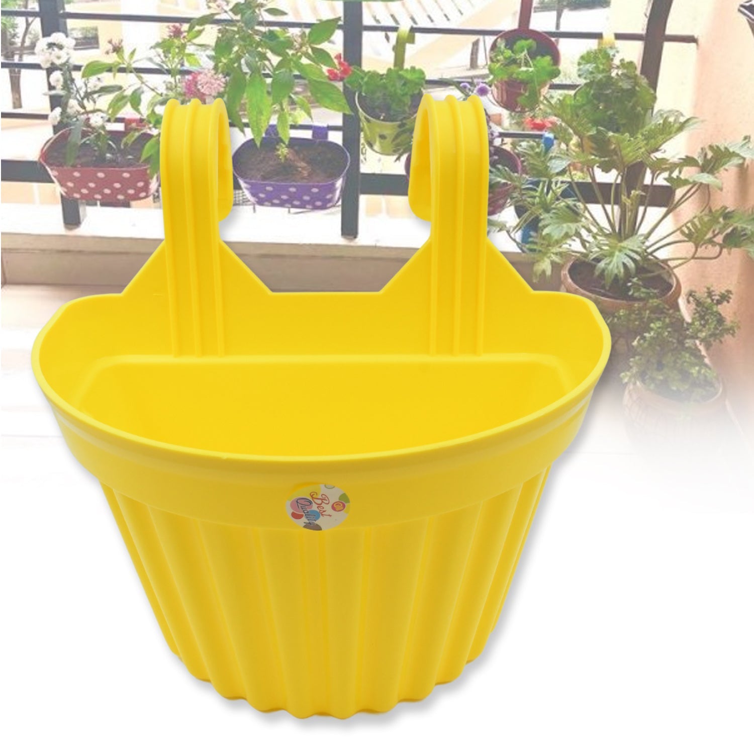 A set of durable hanging plastic planters in various colors for outdoor use.