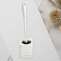 Compact toilet brush set with holder for modern bathrooms.