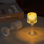 Mini Acrylic LED Desk Lamp illuminating a dark room, showcasing its warm glow.
