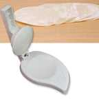 CookAura Puri Press Maker neatly placed on a modern kitchen counter.