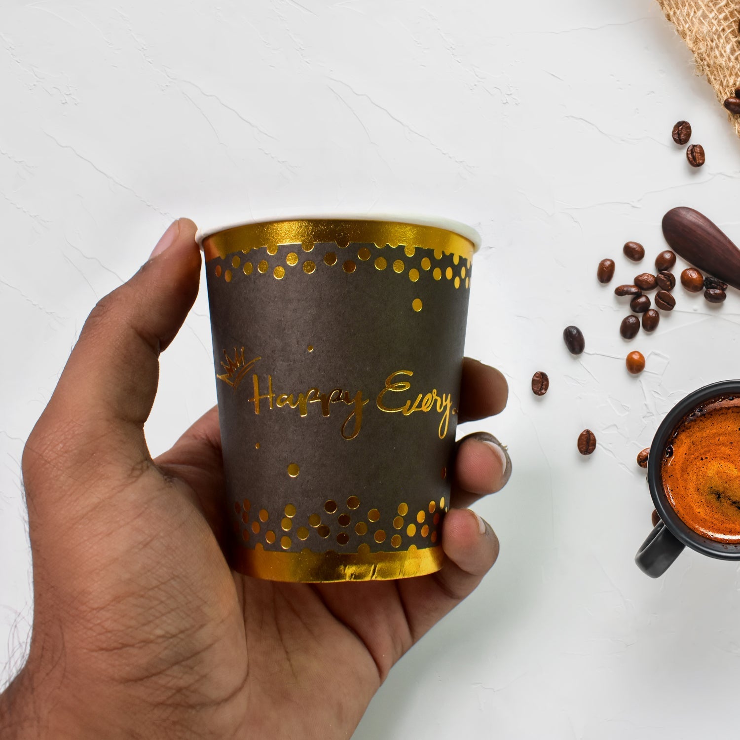 Mixed colour disposable paper cups, perfect for any beverage.