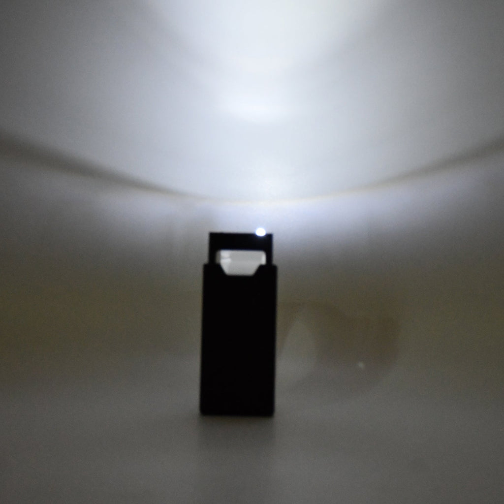 Side view of extendable LED magnifier with durable ABS body