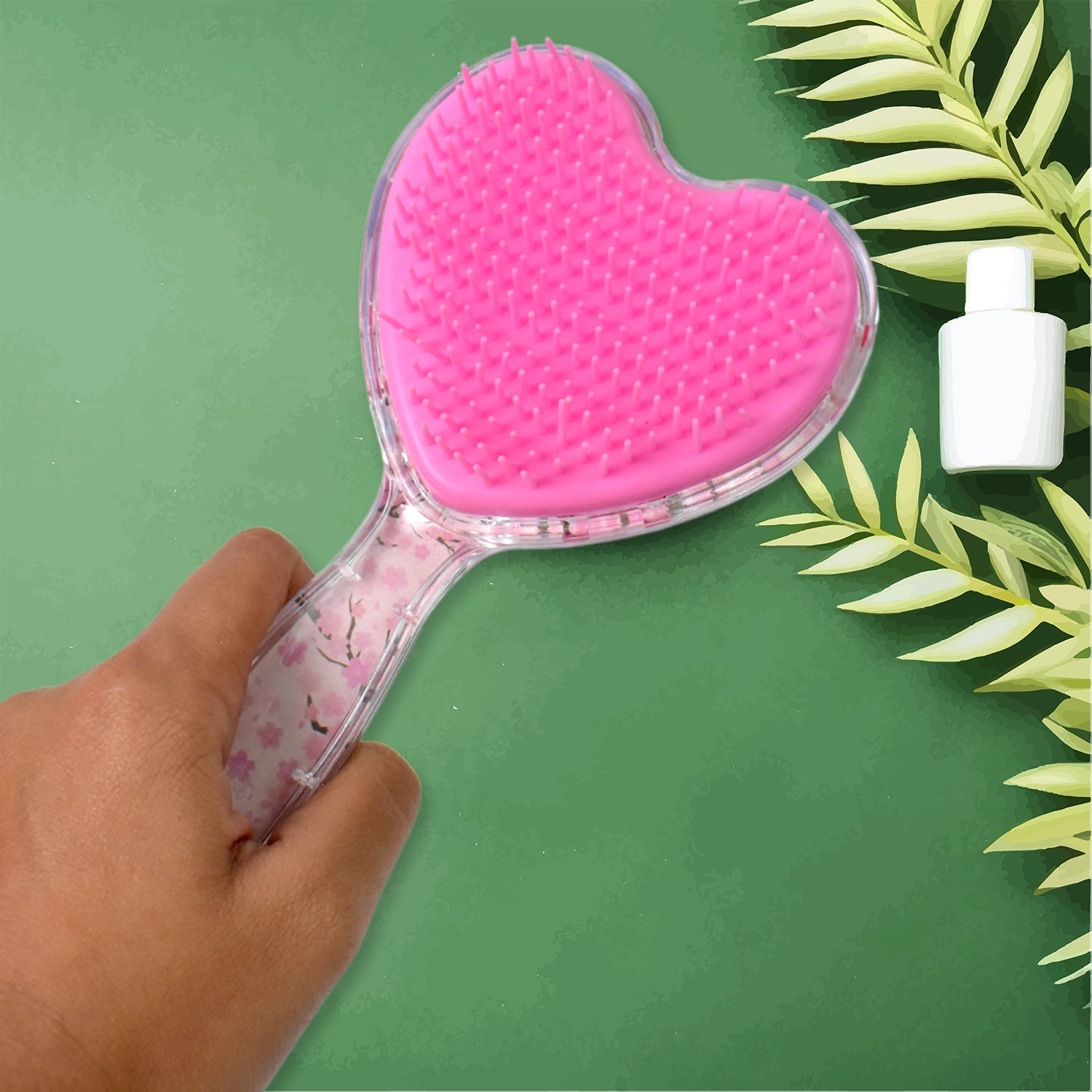 Side view of the heart hair brush, highlighting its comfortable grip and durable design.