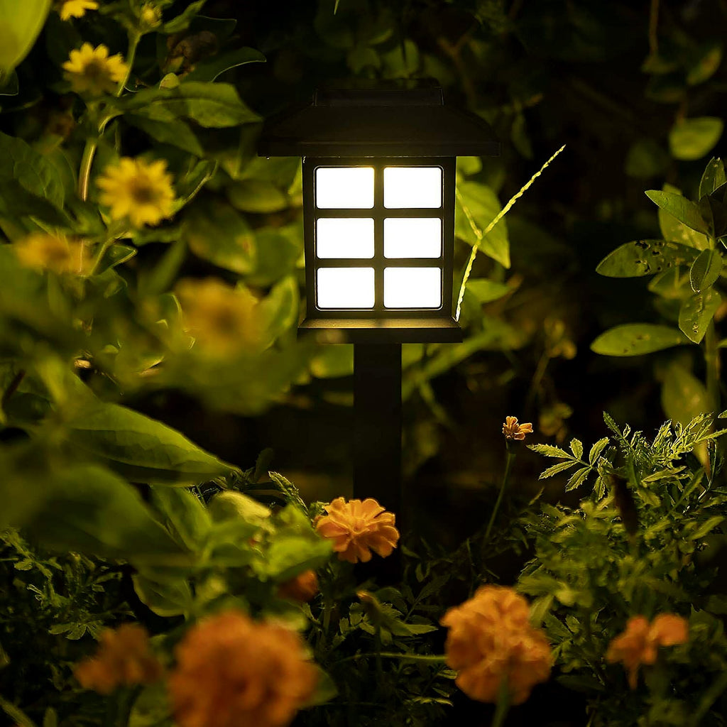 The top view of a solar garden light highlighting its integrated solar panel for efficient charging.