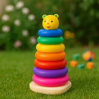 Side view of the 7-piece plastic stacking toy promoting hand-eye coordination.