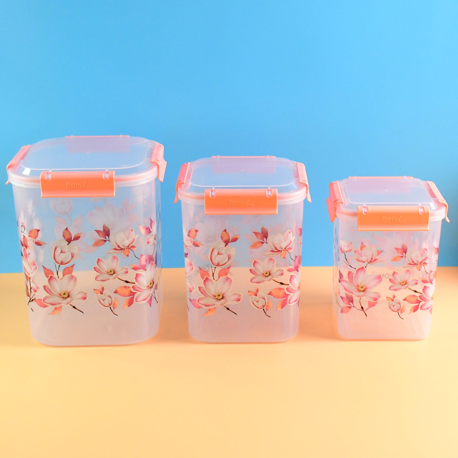 Airtight Food Storage Set with square floral containers in three sizes.