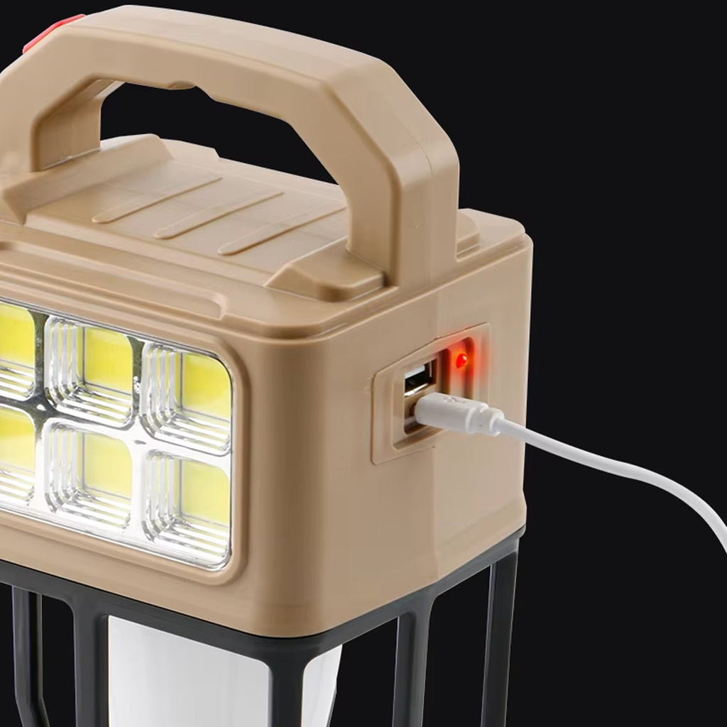 Detail of rechargeable solar camping lantern with USB charging port