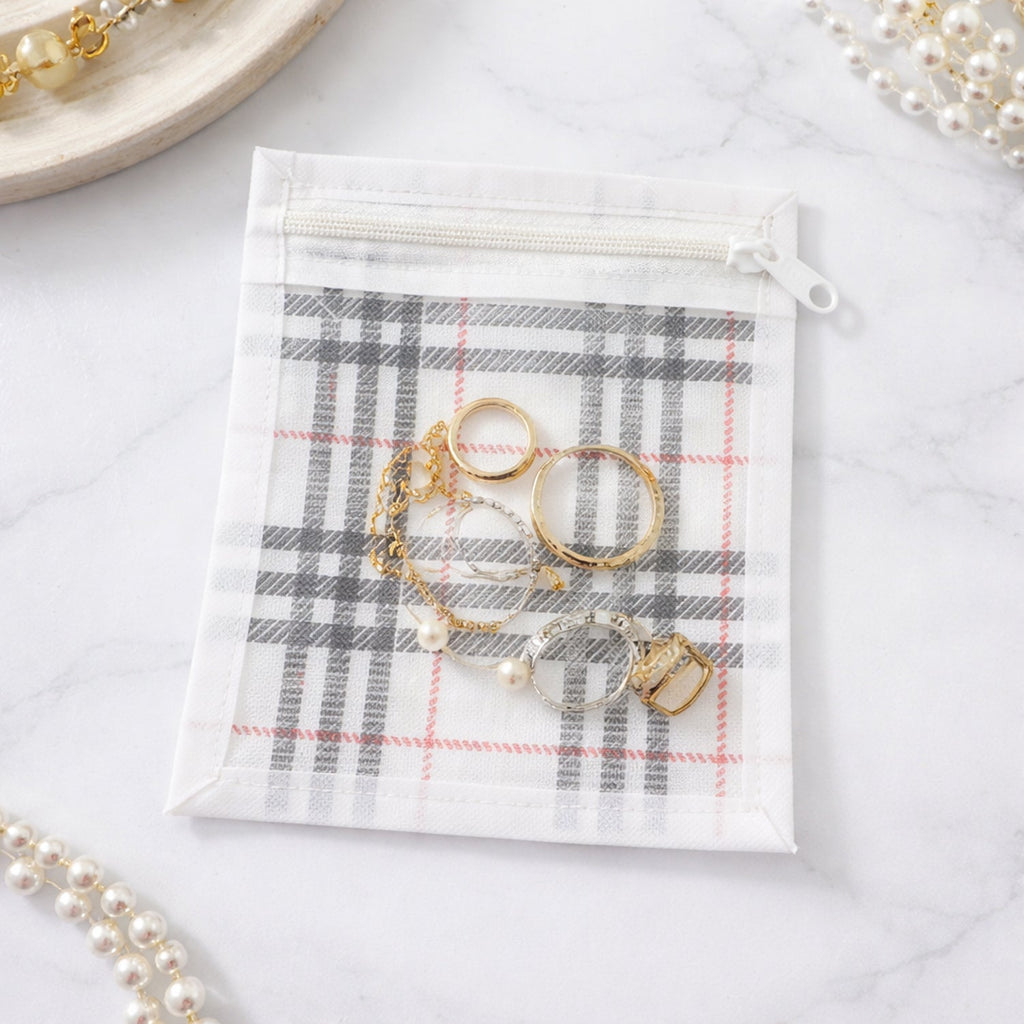 Lightweight and portable 11-in-1 jewellery kit with mesh zipper pouches