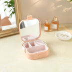 Top view of mini portable jewelry box featuring mirror