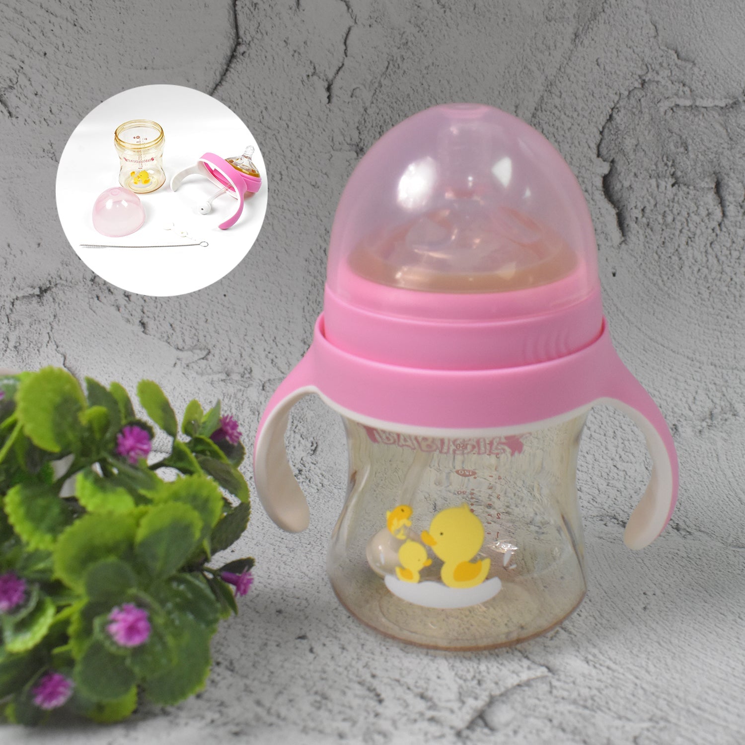 Leakproof baby bottle featuring a soft silicone nipple and easy-grip handles.