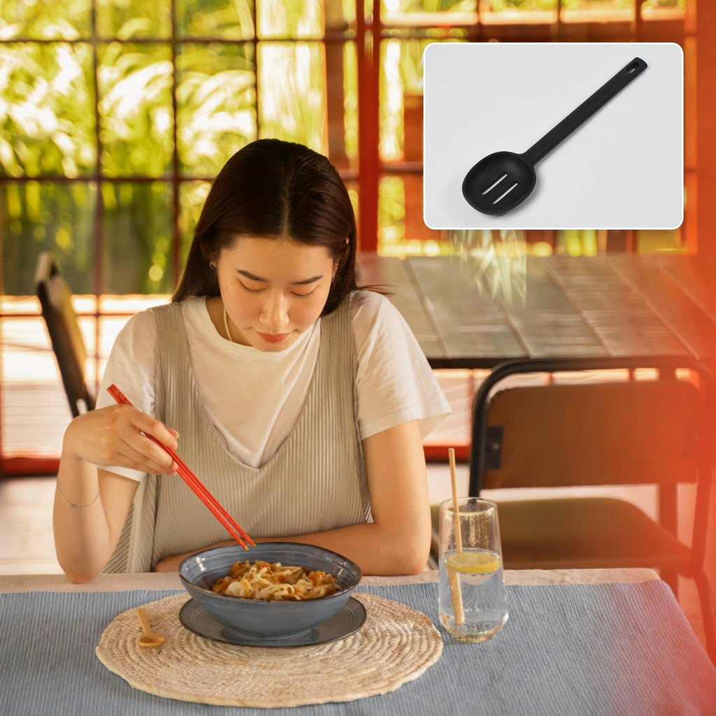 Durable non-stick silicone spoon in a close-up shot.