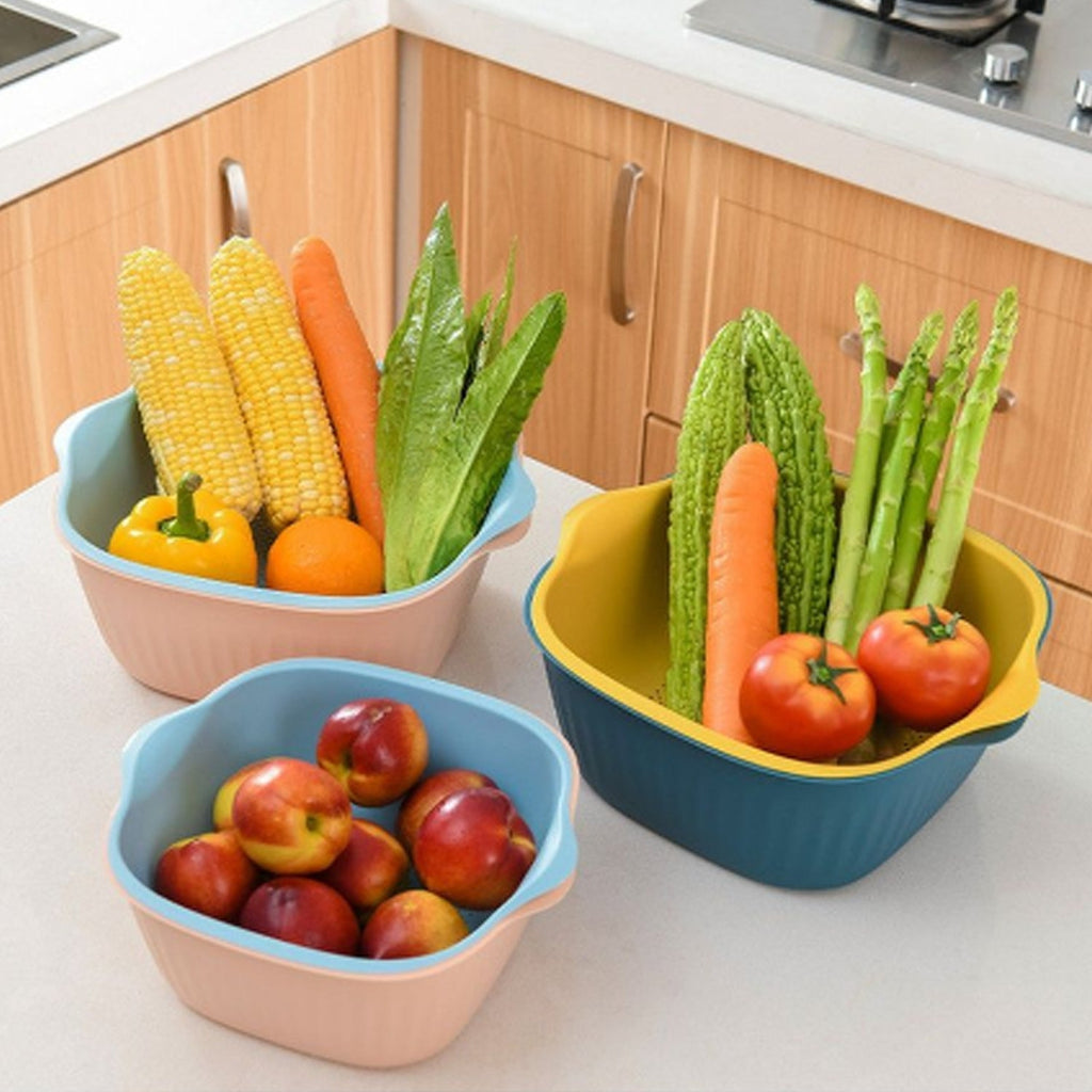 Ergonomic plastic washing bowl with handles for easy use.