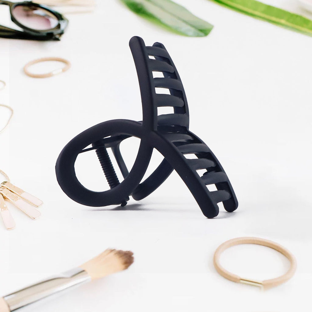 Multiple plastic hair clamps in a simple matte finish
