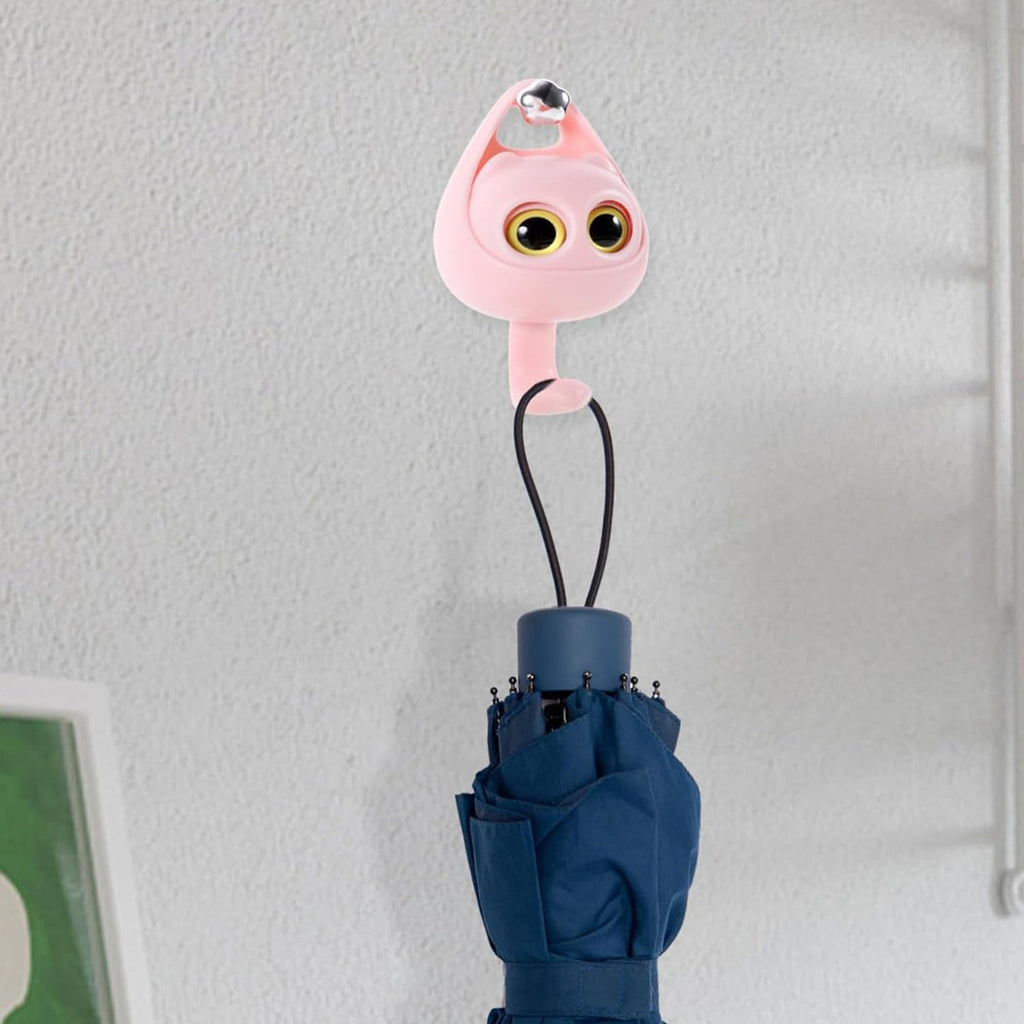 Side profile of the creative wink cat adhesive coat hook showing its sturdy build.