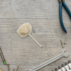 Detailed view of the soft yet effective cotton polishing wheel material.