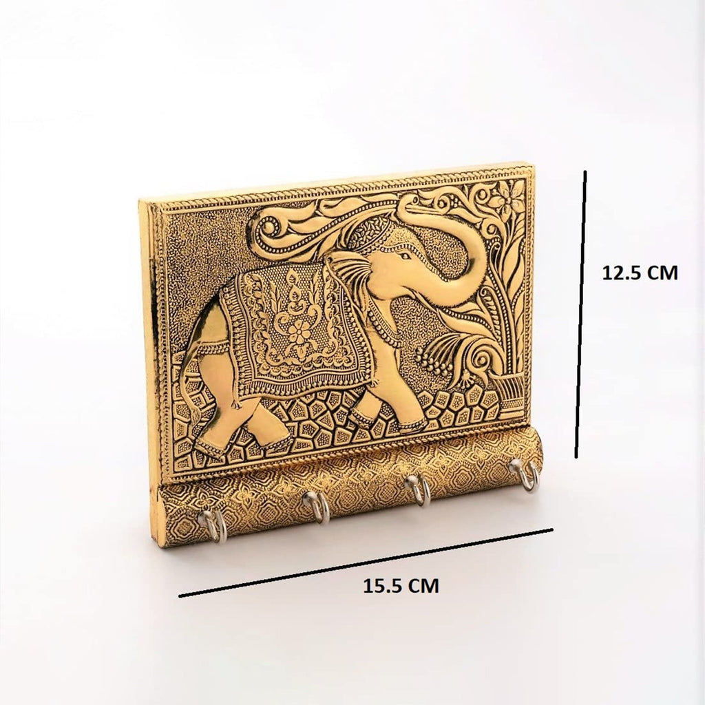 Angled view highlighting the intricate details of the wall-mounted wooden elephant key holder.