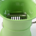 Close-up image of sharp stainless steel blades of manual cutter grinder