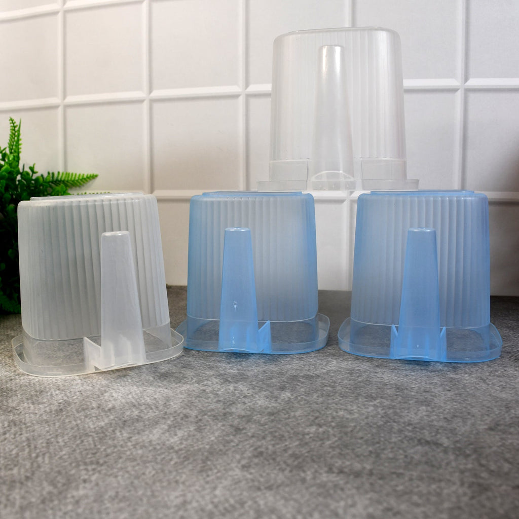 Stacked transparent water mugs, illustrating their space-saving design and mixed colour assortment.
