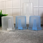 Stacked transparent water mugs, illustrating their space-saving design and mixed colour assortment.