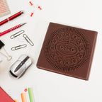 Top-down view of the chocolate scented notebook, emphasizing its compact size.