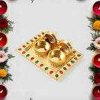 Side profile of the decorative plastic pooja thali, showcasing its compact size.