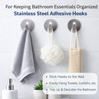 A sturdy stainless steel hook perfectly installed on bathroom tiles, ideal for towels.