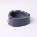 Unbreakable grey plastic ashtray with smooth surface for easy cleaning