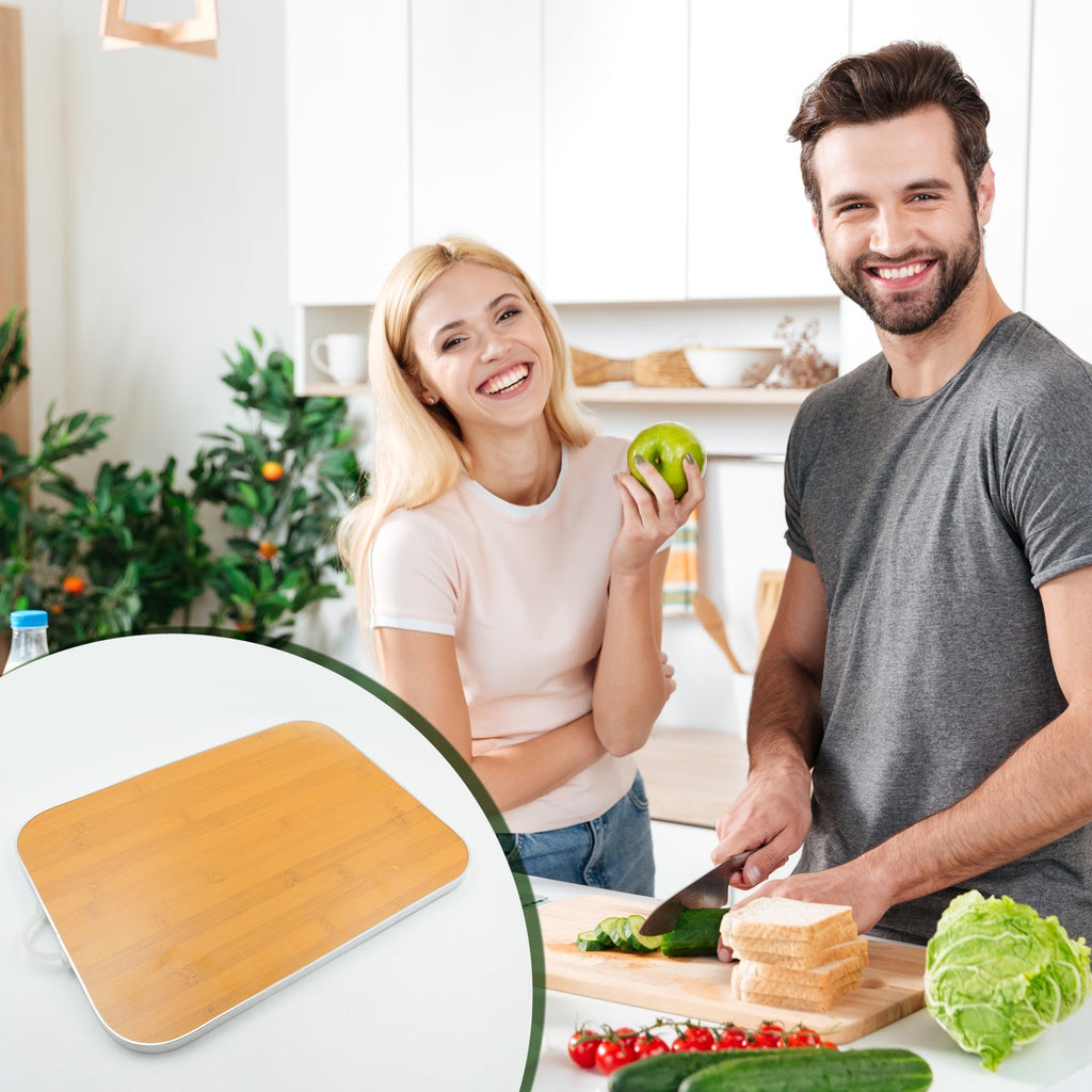 Angled view of the thick, durable bamboo chopping board ready for use.